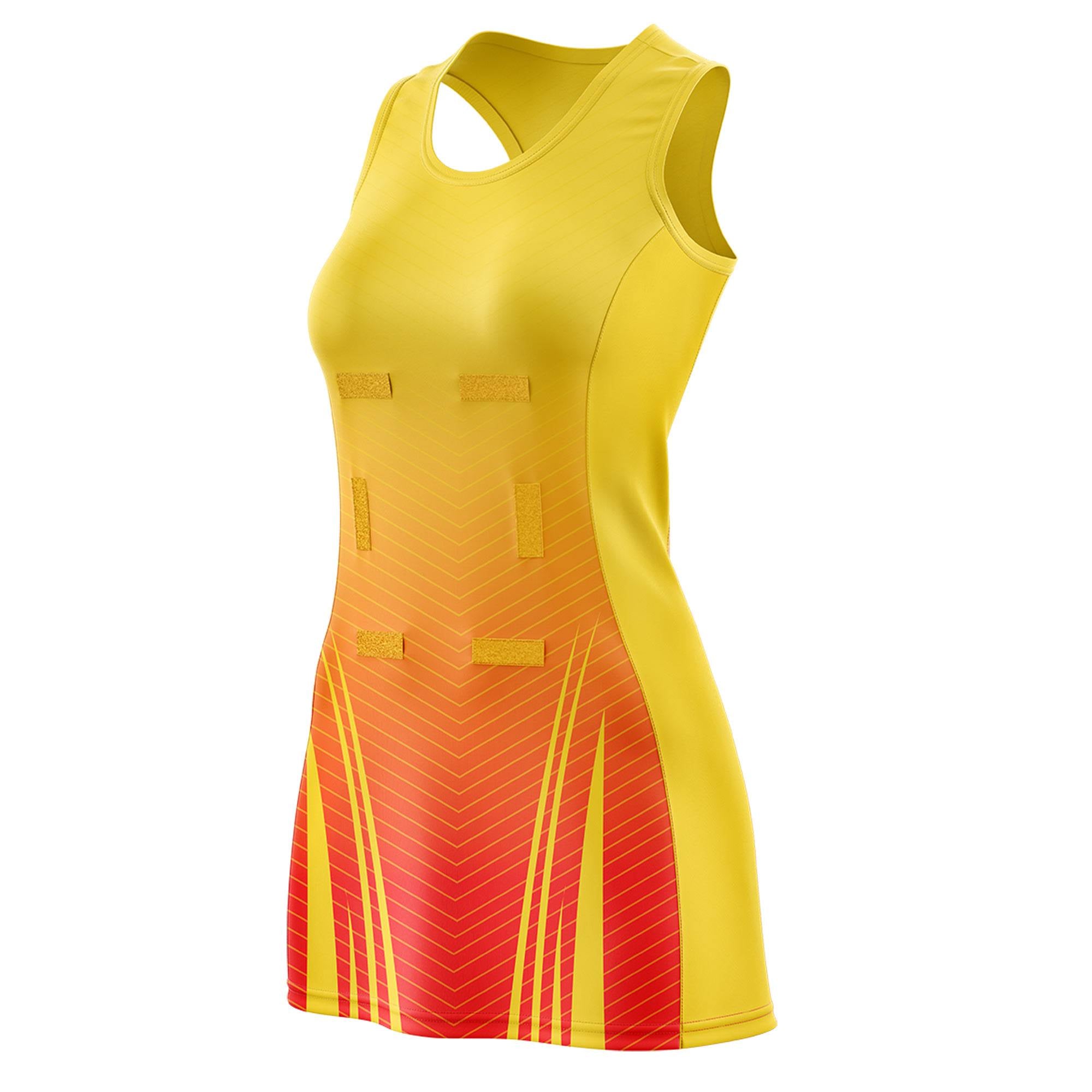 Custom Gold Orange Netball Dresses With Diagonal Lines And Jagged Texture Patterns