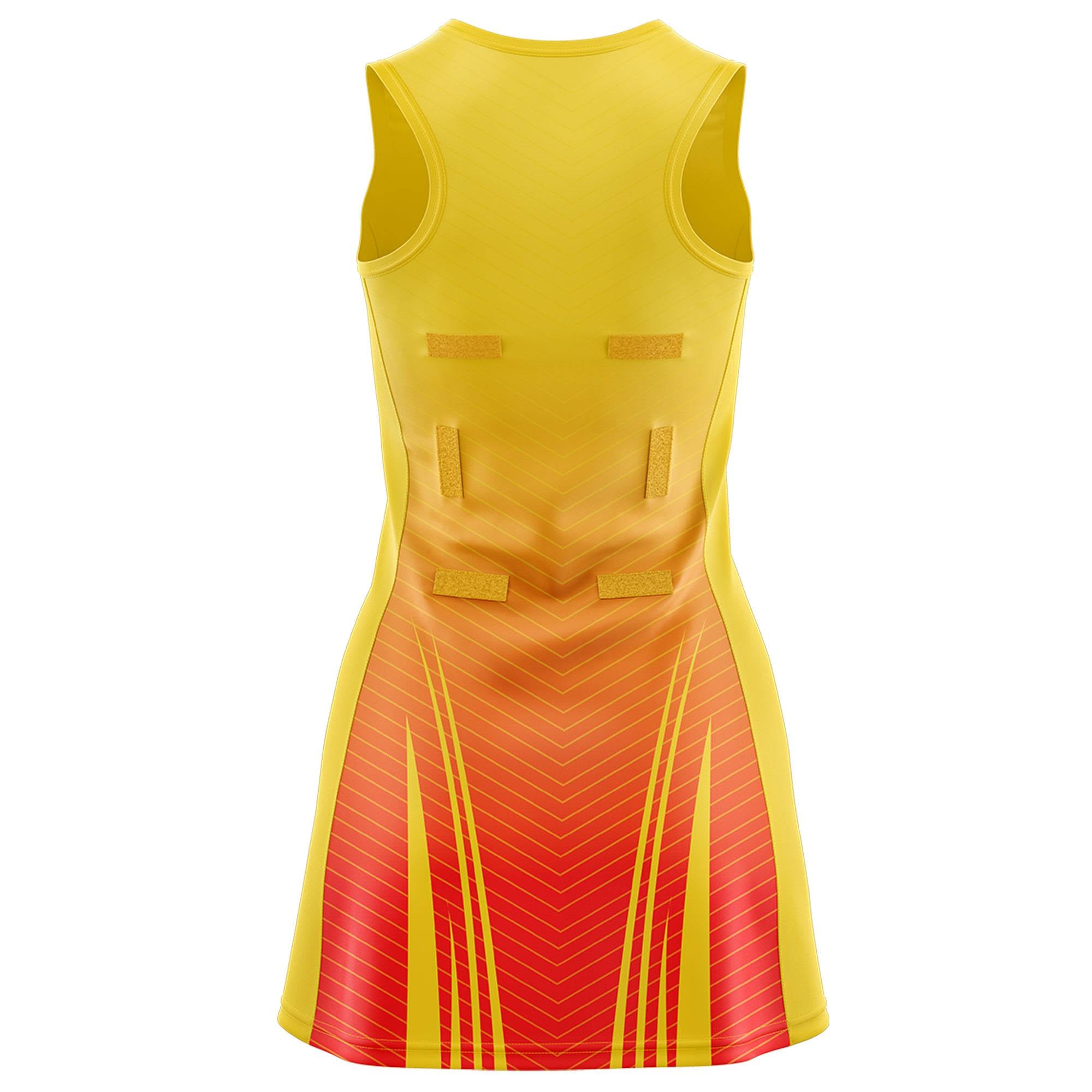 Custom Gold Orange Netball Dresses With Diagonal Lines And Jagged Texture Patterns